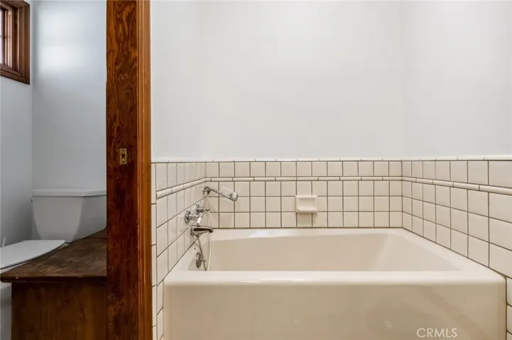 Upstairs full bath with separate shower/toilet room