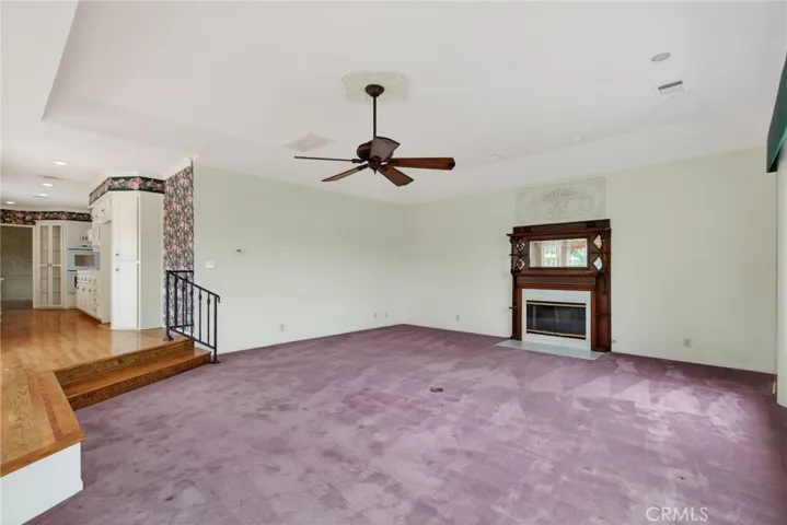 Step-down family room with fireplace #2 - original photo