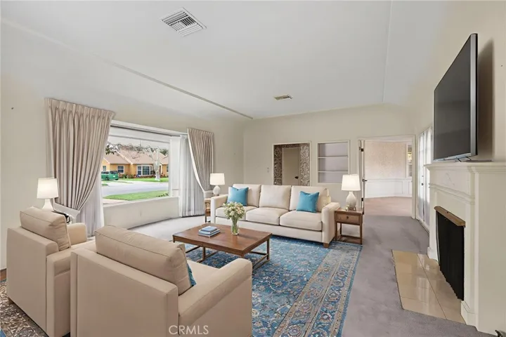 Living room with fireplace #1 - virtually staged