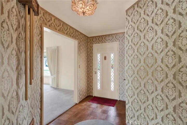 Foyer with original light and doorbell