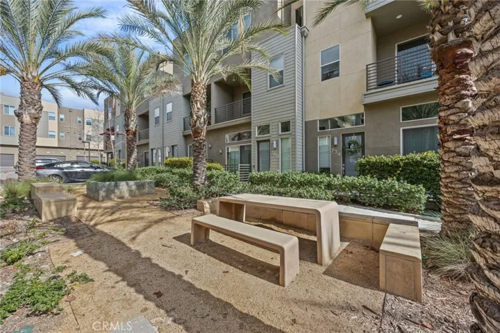 sitting area in front of subject unit's building