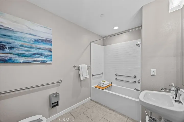 full bath inside office/guest bedroom on 1st floor (ADA compliant with room for closet)