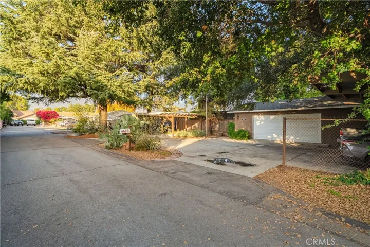 View of the front of the home and private street.  DO NOT ENTER without scheduled showing.