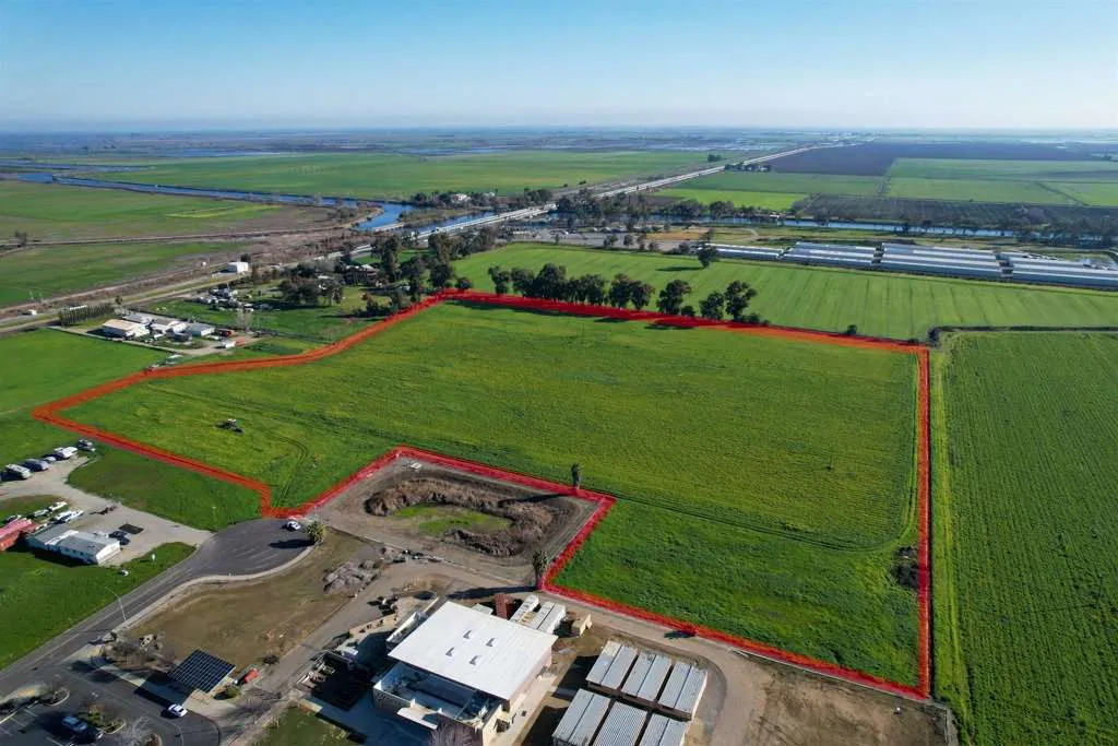 View of rural area featuring abundant farmland and property parcel outlined