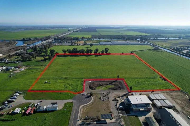 View of rural area with extensive farmland and property parcel outlined