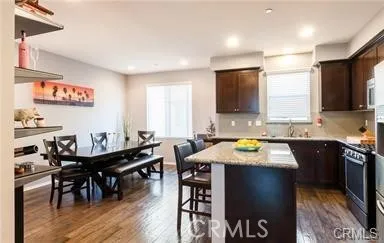 Distressed Wood Floors, high ceilings and granite counters