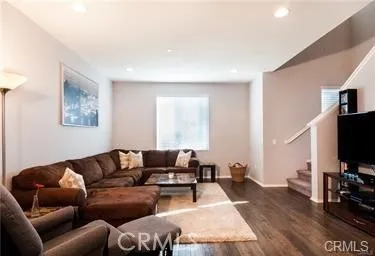 Living Room Adjacent to Kitchen and Dining