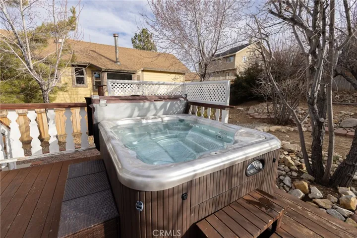 Step onto the the backyard deck and soak in the hot tub after a day of skiing, hiking, or exploring Big Bear