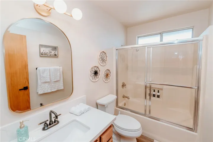 Upstairs bathroom is updated with modern accessories and fixtures