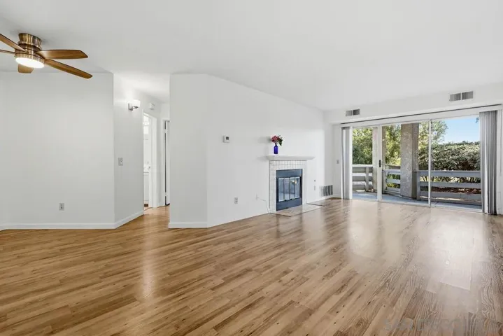 Open and bright family room with direct access to private patio.