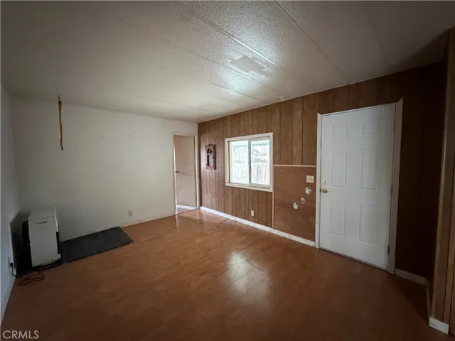 living room with closed front door