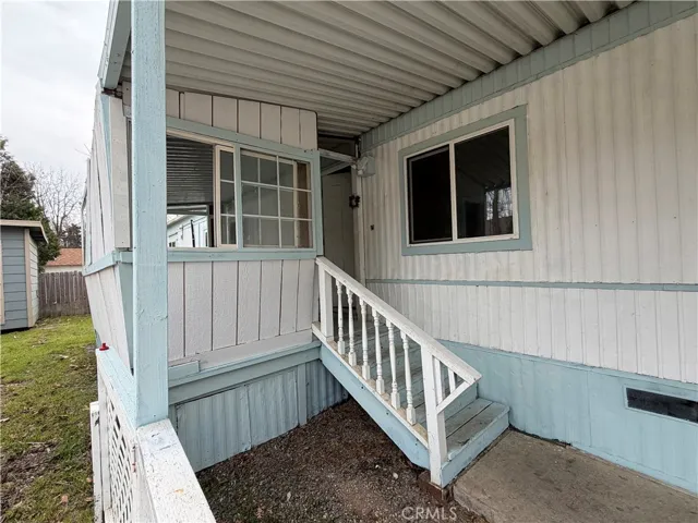 walking up to entrance of house