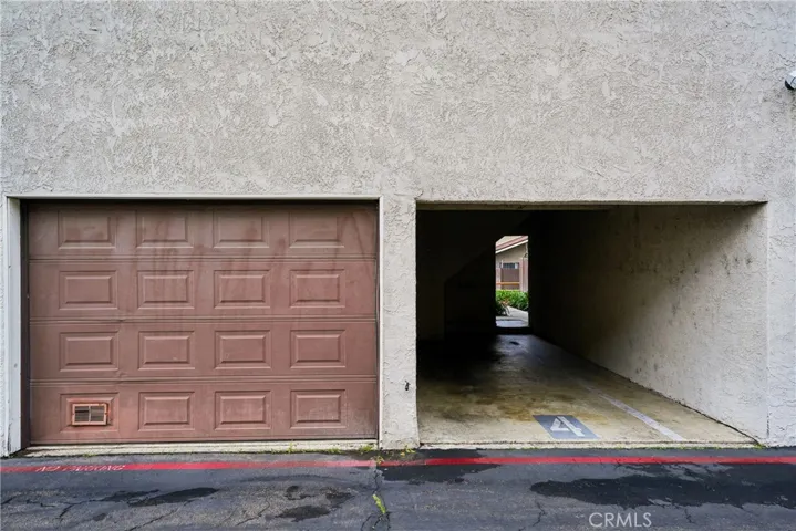 one car attached garage and Carport