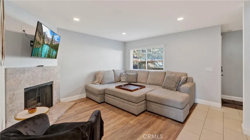 The living room is pretty good sized and include a fireplace for those cozy nights.