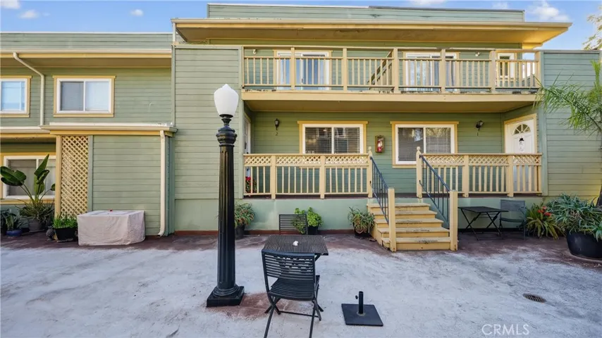 Unit 2 is located on the left side of the stairs.