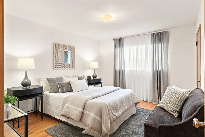 Bedroom featuring wood finished floors