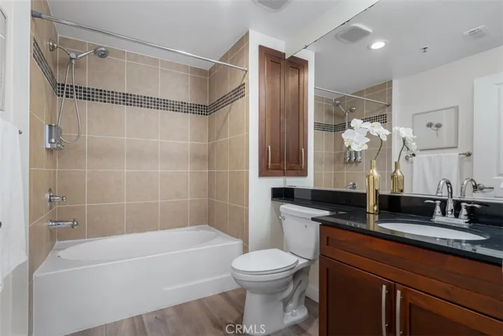 Soacious primary bath with shower over tub