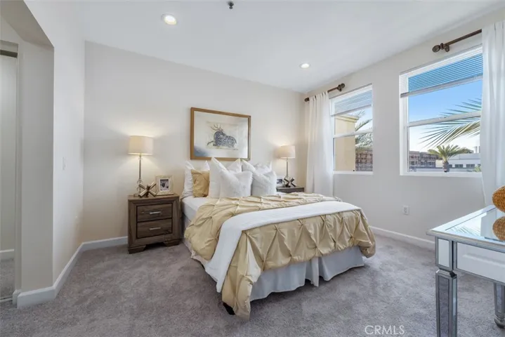 Recessed lighting and brand new carpet and wood flooring