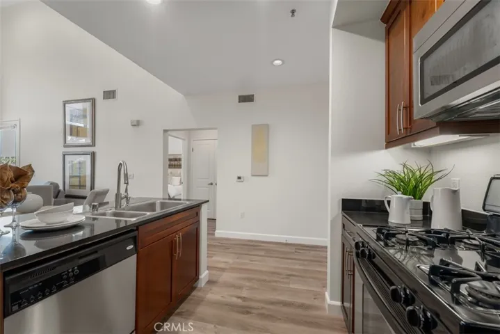 Open galley kitchen to dining and living area