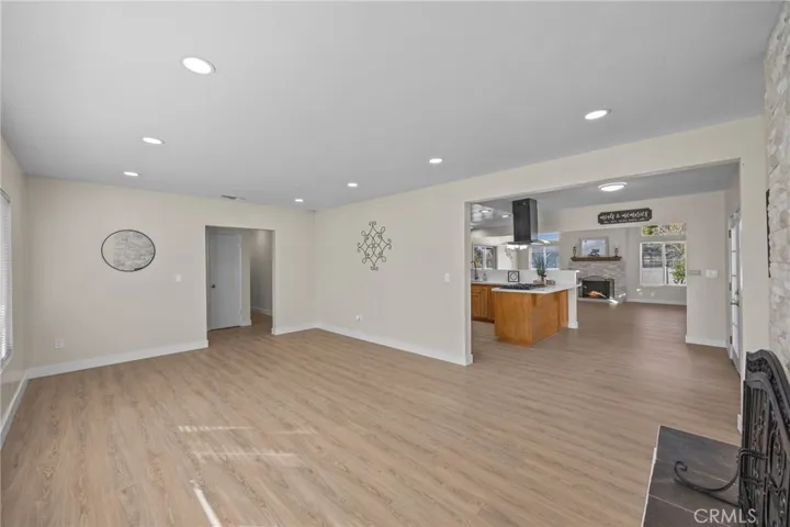 Living room shows access to kitchen