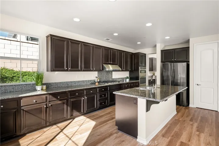Kitchen Opens to Spacious Family Room