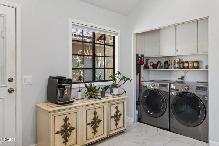 Kitchen with laundry area