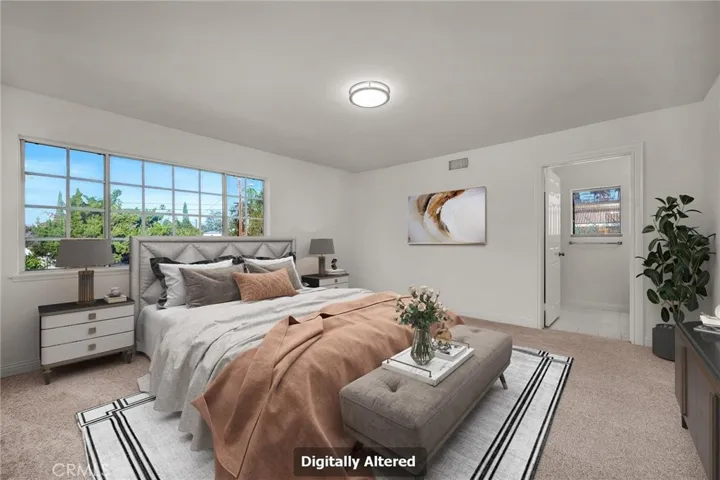 VIRTUALLY STAGED Primary Bedroom with attached private bathroom