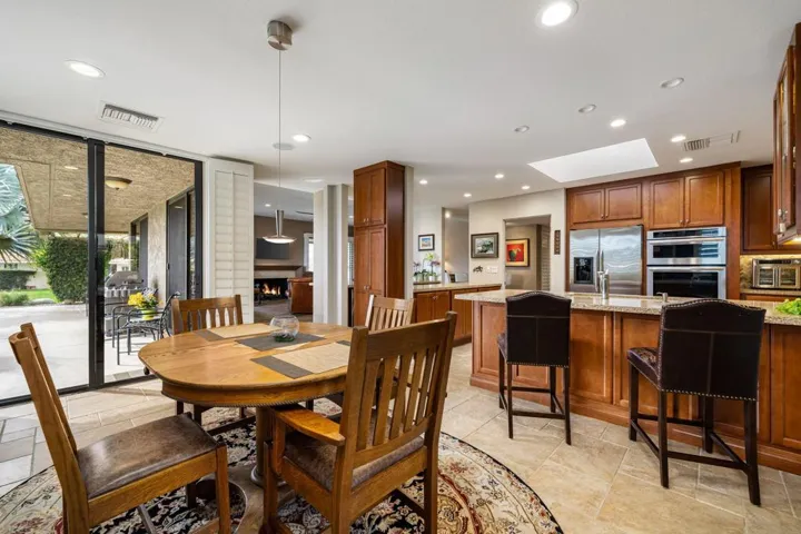 Reverse View of Dining Area & Kitchen