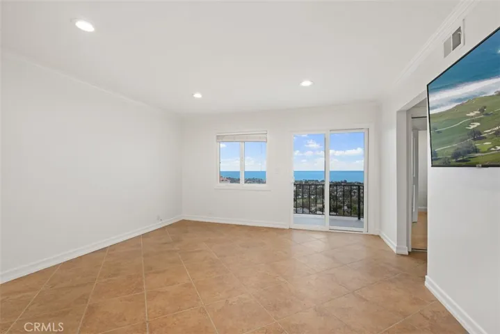 Primary bedroom upstairs with balcony and Views!