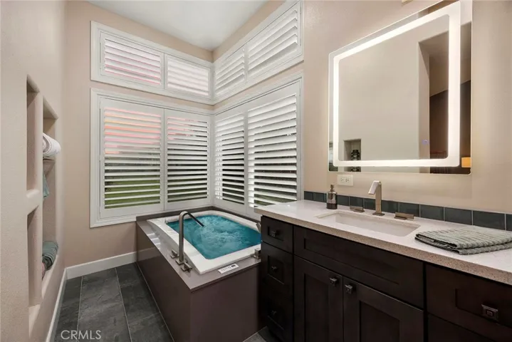 Spa jetted enclosed tub with led colored lighting