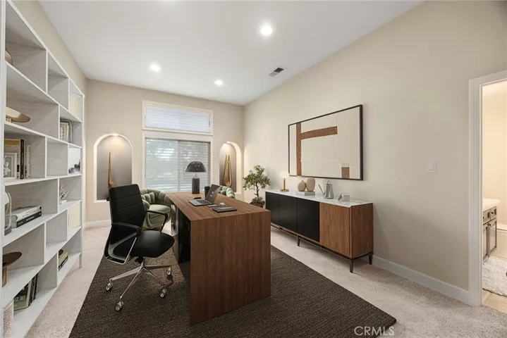 Virtually staged as an office downstairs