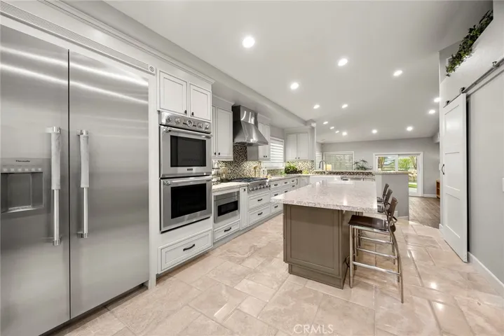 Galley of the Kitchen show off the high end Thermador appliances.
