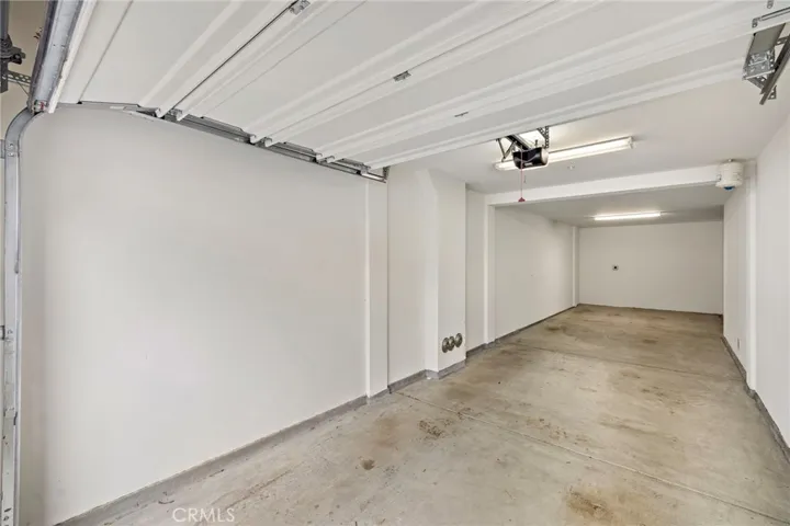 Large 2 Car tandem garage with extra storage and EV Charging outlet