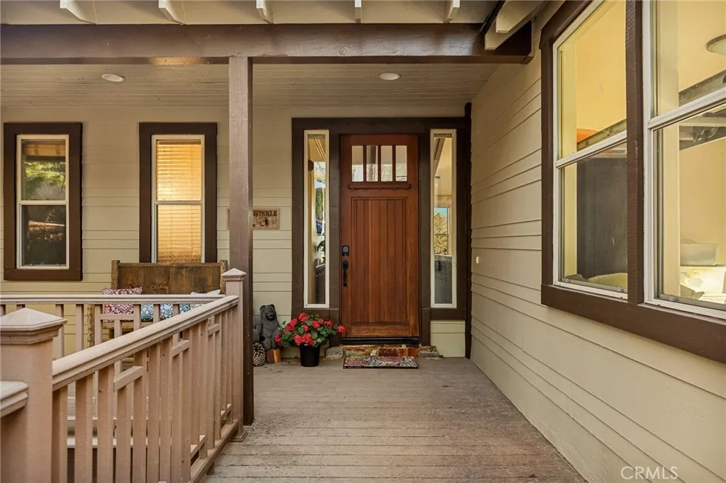 Front entry with garage windows to the right.