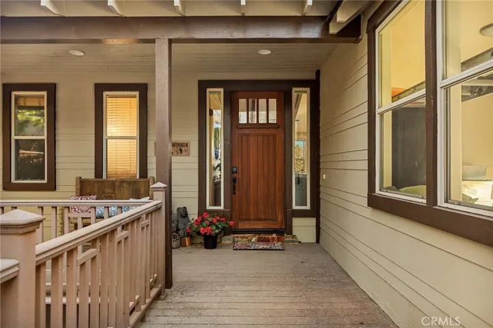 Front entry with garage windows to the right.