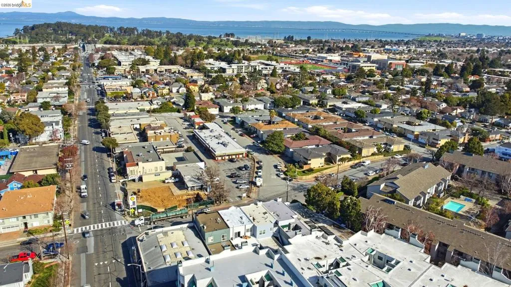 View of property location featuring a water and mountain view