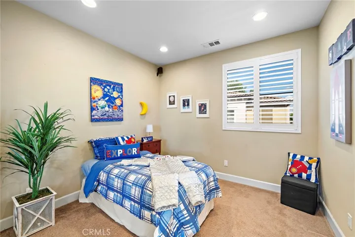 bedroom on 3rd level next to primary suite