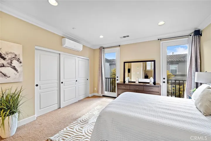 Primary bedroom has french doors