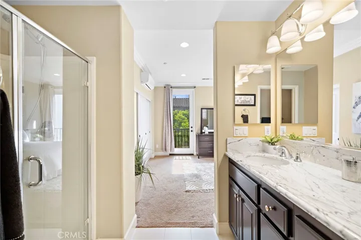 Walk in shower in the primary suite