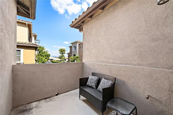 private second-level patio perfect for evening barbeques and dining