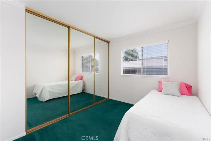 Second bedroom with 3 Mirrored closet doors