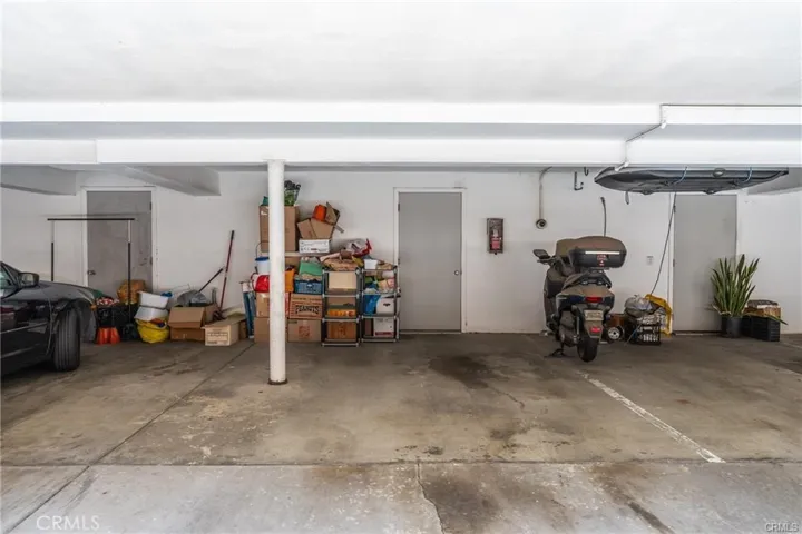 Parking space and door to private storage room