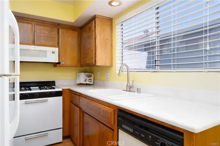 Kitchen Gas Stove, refridgerator and Dishwasher