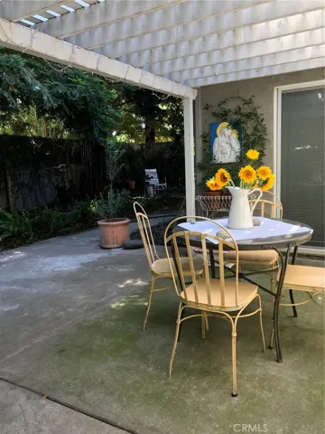 Covered patio area, photo provided by Seller