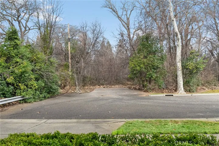 View from front porch, the creek and bike trail are on the other side