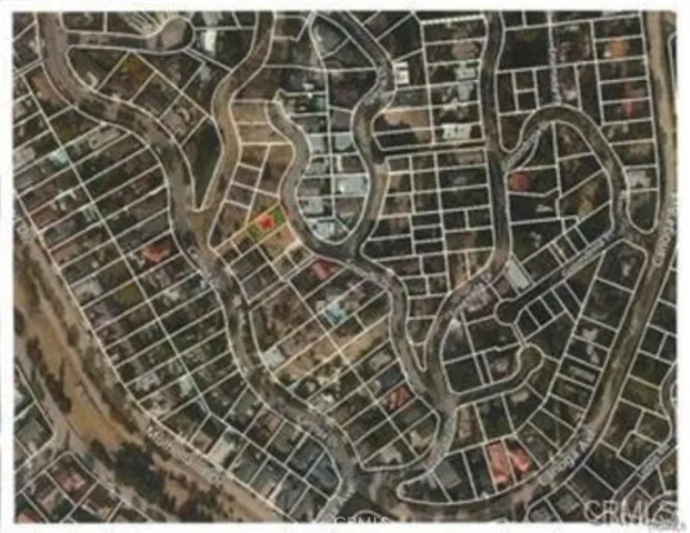 Aerial map of neighborhood with the red star marking the lot.