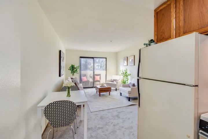 Living area with light carpet