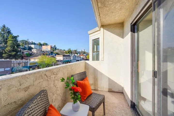 Balcony featuring a residential view
