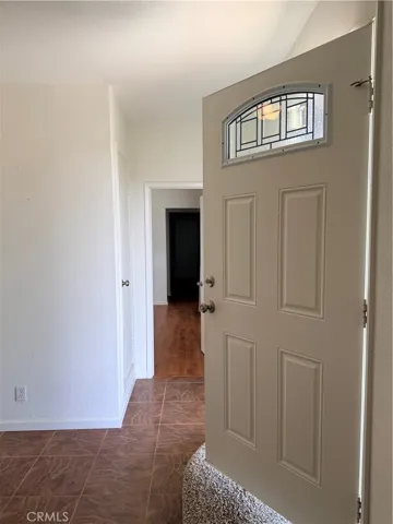 To the right wing of the house