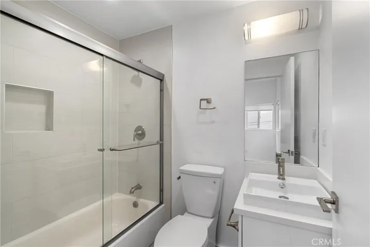 second floor bathroom with bath tub.